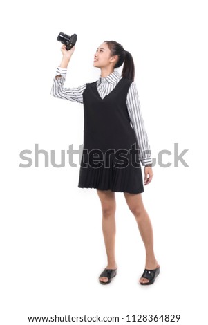Asian girls taking a separate photo from a white background.