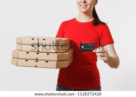 Delivery woman in red cap, t-shirt giving food order italian pizza in cardboard flatbox boxes isolated on white background. Female pizzaman working as courier holding credit card. Cropped photo