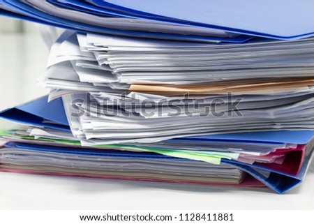 file folder and Stack of business report paper file with white background - isolated