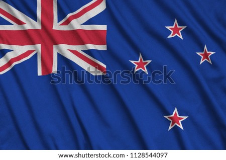 New Zealand flag  is depicted on a sports cloth fabric with many folds. Sport team banner