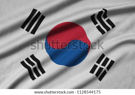South Korea flag  is depicted on a sports cloth fabric with many folds. Sport team banner