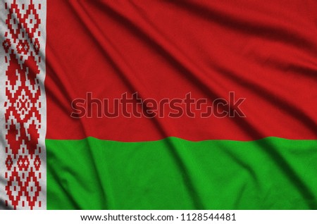 Belarus flag  is depicted on a sports cloth fabric with many folds. Sport team banner