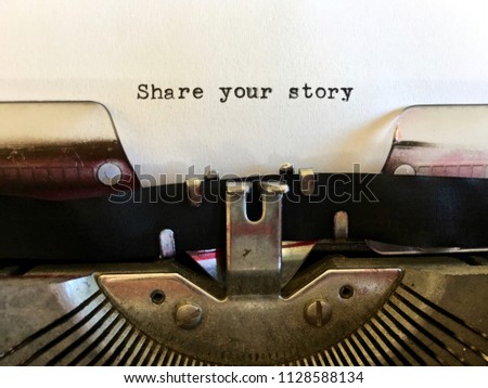 Share your story, title headline typewritten on white paper on manual vintage typewriter machine