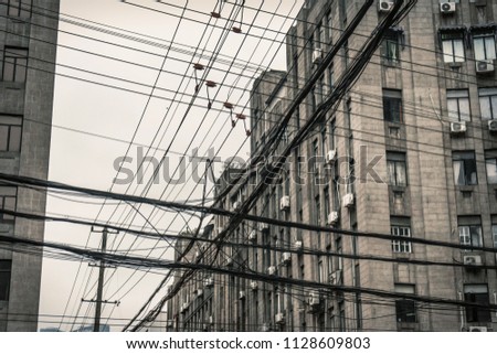Messy wire cable line at crossroads Shanghai, China