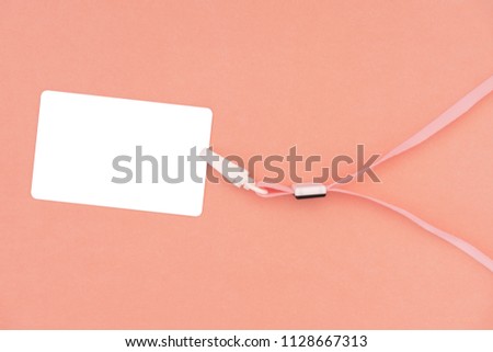 Blank badge card mockup ID tag of staff employee business, empty tag name for hanging on neck with ribbon string .