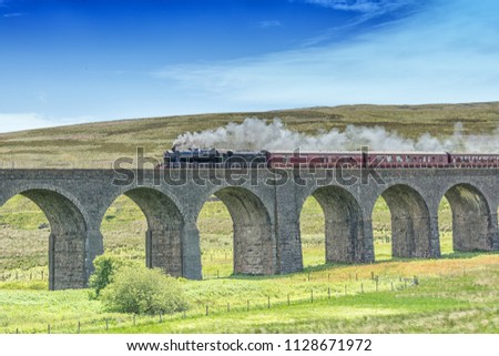 Stanier steam locomotive on Garsdale viaduct on the Settle to Carlisle line Royalty-Free Stock Photo #1128671972