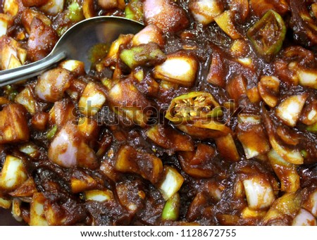 appetizing spicy malay pickle (achcharu)  served at a feast - dinner -  in Sri Lanka
