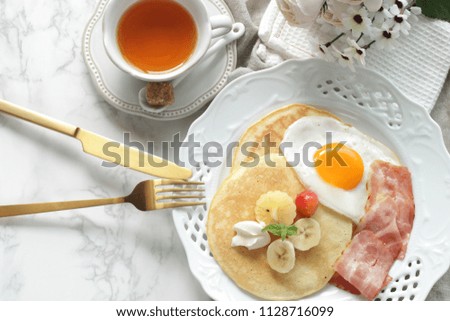Banana and Japanese cherry on pan cake for gourmet breakfast image