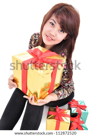 cheerful girl with many gifts, isolated on white background