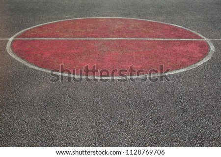 Red circle as center of a basketball yard. Abstract composition. 