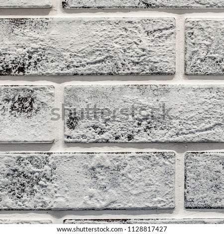 Concrete brick wall background / solid construction. Large scale blocks. Painted bricks texture. Development system. Building Technologies. Gray seamless pattern [square format]