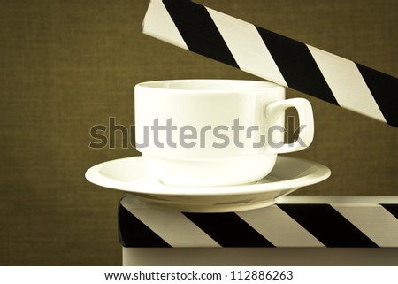 fine image of coffee break concept with cup on clapboard