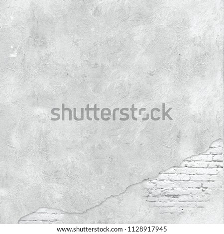 Vintage old white wall with cracks. Plastered wall with cracks and white bricks. High resolution background for 3d wallpaper and cards design. 