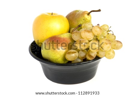 Bowl with fresh fruits isolated on white background