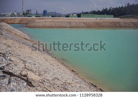  A view of a rain water pond on the construction site.