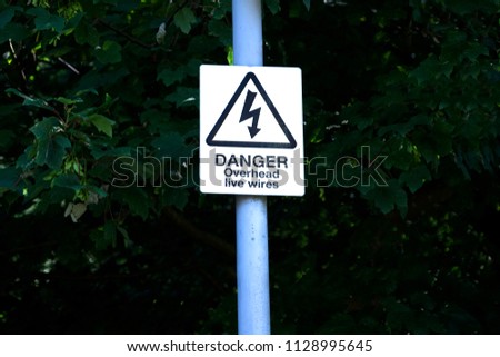 Danger of death overhead live cables electricity can kill
