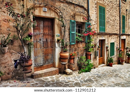 charming streets of old mediterranean towns Royalty-Free Stock Photo #112901212