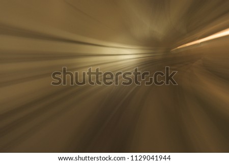 Blur motion and abstract background effect from inside Malaysian Mass Rapid Transit (MRT) tunnel.