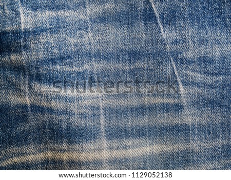 Legs blue jeans texture-closeup 
