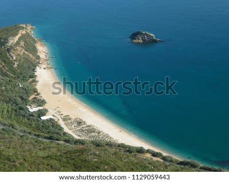 Picture of a mountain in Portugal, its landscape and a blue sea.