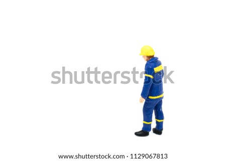 Miniature people engineer worker construction concept on white background with a space for text