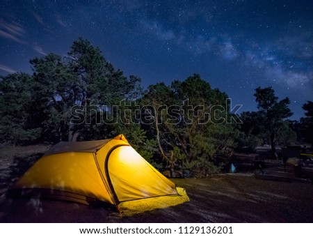 USA, Nevada, White Pine County, Egan Range, Humboldt-Toiyabe National Forest. A tent lit up under the milky way at Ward Mountain Campground.