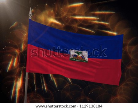 Flag of Haiti with fireworks display in the background