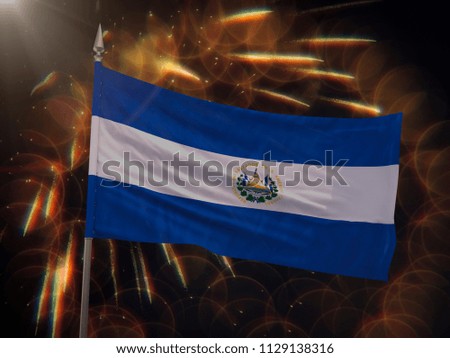 Flag of El Salvador with fireworks display in the background