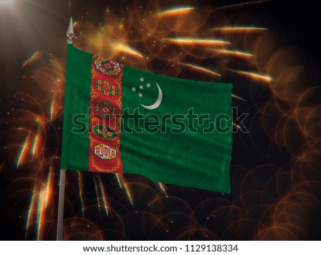 Flag of Turkmenistan with fireworks display in the background
