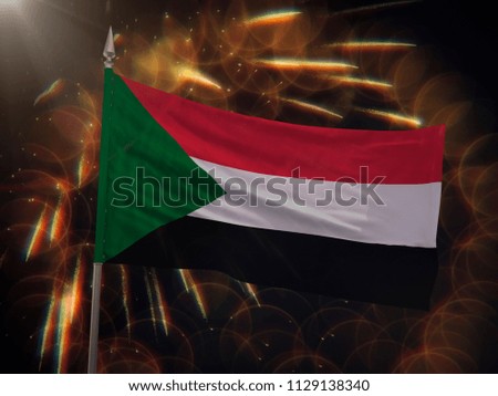 Flag of Sudan with fireworks display in the background