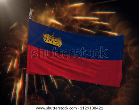 Flag of Liechtenstein with fireworks display in the background