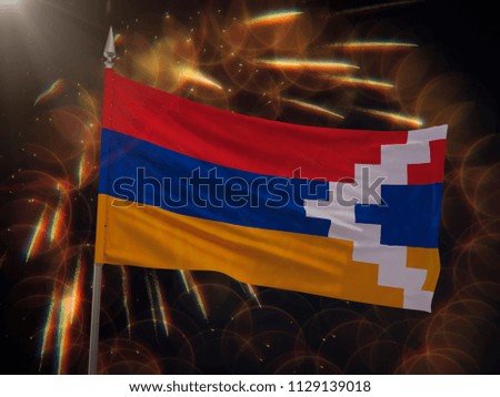 Flag of Artsakh Nagorno-Karabakh with fireworks display in the background