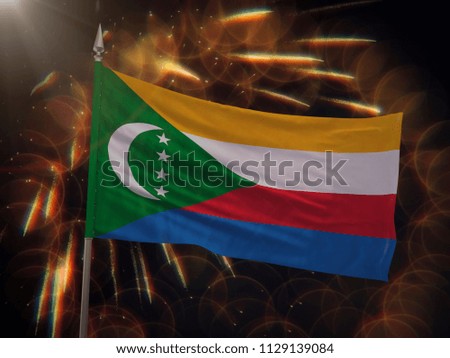 Flag of the Comoros with fireworks display in the background