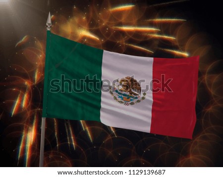 Flag of Mexico with fireworks display in the background