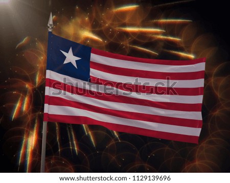 Flag of Liberia with fireworks display in the background