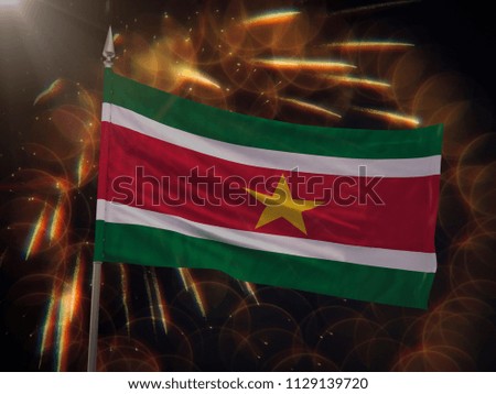 Flag of Suriname with fireworks display in the background