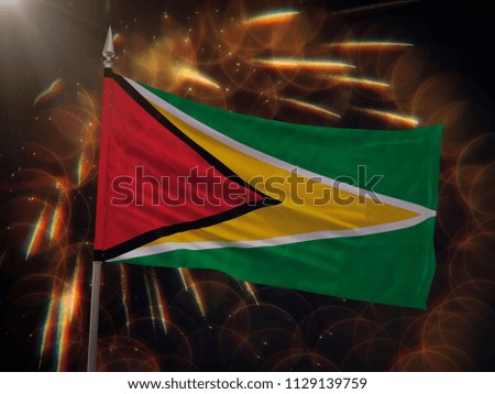 Flag of Guyana with fireworks display in the background