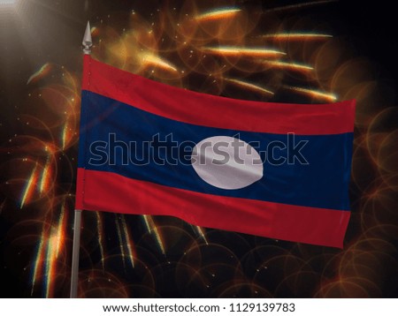 Flag of Laos with fireworks display in the background