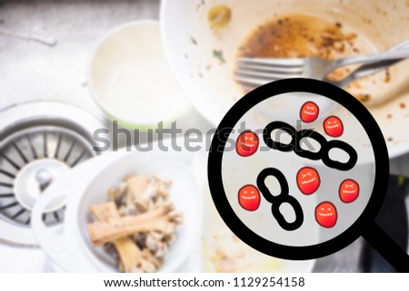 Disinfection concept. Closeup magnifying glass showing bacteria, virus isolated on pile of dirty dishes on sink background.
