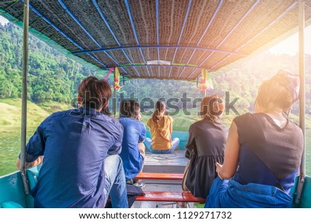 Tourists in small boat tours, thailand Royalty-Free Stock Photo #1129271732
