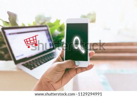 close up of young woman hand search and Shopping online concept