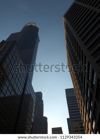 Minneapolis downtown - city of skyscrapers. Taken from the ground level. Blue sky. USA.