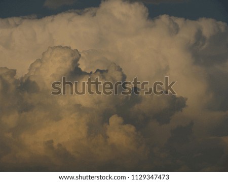 Clouds, sky, thermal stream, at sunset blurred