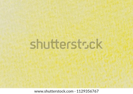 Abstract yellow watercolor painting textured on white paper background