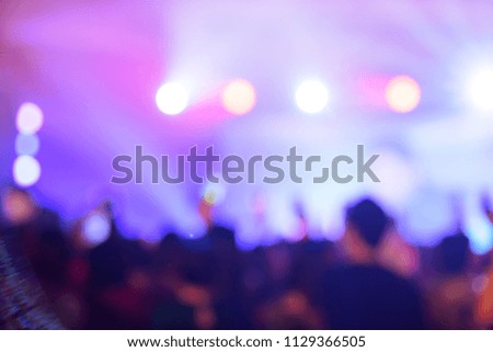 Blurred background , Bokeh lighting on stage in concert with audience, Celebration concept.