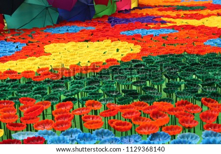 Colorful flowers from candles in the candle festival.