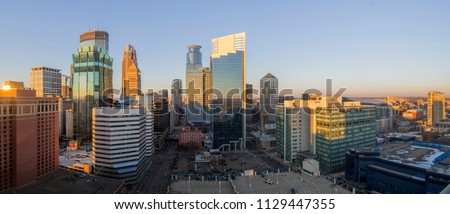 An Ultra Wide Angle Panoramic Shot of Sprawling Downtown Minneapolis during a Spring Golden Hour