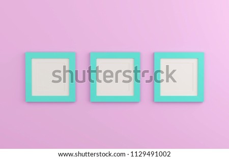 Blank mint color picture frame template for place image or text inside on pink wall.