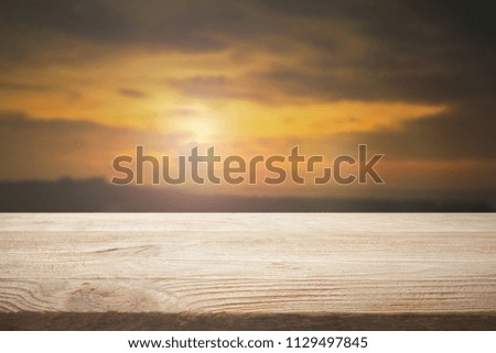 Perspective wood floor brown color texture with blur beautiful nature background.