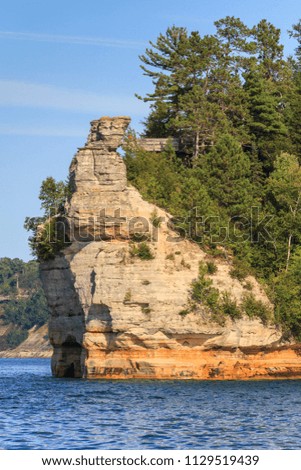 Sandstone cliffs on the shoreline of Lake Superior in Pictured Rocks National Lakeshore, Michigan, USA